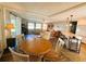 The open-concept area combines the kitchen and living area, great for entertaining at 102 Tangelo Cv, Leesburg, FL 34748