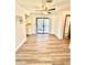 Dining area with sleek floors, ceiling fan, and sliding glass doors at 10529 Se 50Th Ave, Belleview, FL 34420