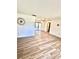 Open-concept living area boasts modern floors, white walls, and seamless flow at 10529 Se 50Th Ave, Belleview, FL 34420
