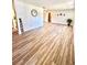 Spacious living room featuring beautiful flooring, neutral walls, and ample natural light at 10529 Se 50Th Ave, Belleview, FL 34420