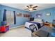 Bedroom with blue walls, white trim, a window and carpet at 1085 Harmony Ln, Clermont, FL 34711