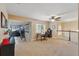 A spacious loft with natural light, neutral tones, and a ceiling fan at 1085 Harmony Ln, Clermont, FL 34711