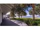 Lush backyard with mature trees and direct access to a pristine sandy beach and tranquil waterfront at 12765 Se 143Rd Ave, Ocklawaha, FL 32179