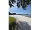 Picturesque beach featuring white sand, clear water, and lush greenery at 12765 Se 143Rd Ave, Ocklawaha, FL 32179