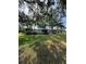 Beautiful one story home with a sprawling front yard, mature trees and screened patio at 12765 Se 143Rd Ave, Ocklawaha, FL 32179