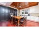 Well-equipped kitchen with modern appliances, countertops, a breakfast bar, and wood floors at 12765 Se 143Rd Ave, Ocklawaha, FL 32179