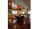 Spacious kitchen with an adjacent eating area, stainless steel appliances, and granite countertops at 12765 Se 143Rd Ave, Ocklawaha, FL 32179