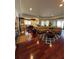 Open-concept living area connecting the living room, kitchen, and offering a beautiful lake view at 12765 Se 143Rd Ave, Ocklawaha, FL 32179