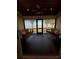 Inviting porch featuring swing benches and a lake view, creating a relaxing outdoor space at 12765 Se 143Rd Ave, Ocklawaha, FL 32179