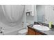 Clean bathroom with vanity, bathtub and shower combination at 1305 Guerra Ave, The Villages, FL 32159