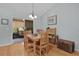 Dining area with a view of the lanai at 1305 Guerra Ave, The Villages, FL 32159