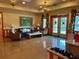 Comfortable lobby with bright decor, stylish furnishings, and natural light at 1305 Guerra Ave, The Villages, FL 32159