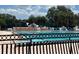 Community pool with fences and lap lanes, perfect for exercise and relaxation in the sunshine at 1305 Guerra Ave, The Villages, FL 32159