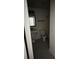 Bathroom with vanity, toilet, and black and white floor tiles at 2013 Dixie Belle Dr # 2013K, Orlando, FL 32812