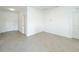 Bright living room showcasing stylish tile floors and a welcoming atmosphere at 2117 Emma Ln, Lake Wales, FL 33898