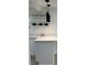 Close up of a modern kitchen featuring sleek countertops and stylish pendant lighting at 2217 Azalea Ct, Lakeland, FL 33815