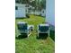 Lawn area with lounge chair set at 313 Palo Verde Dr, Leesburg, FL 34748