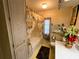 Bathroom with a shower-tub combination, toilet, and single sink vanity at 313 Palo Verde Dr, Leesburg, FL 34748