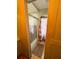Bathroom featuring a glass-enclosed shower and floral shower curtain at 313 Palo Verde Dr, Leesburg, FL 34748