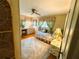 Cozy bedroom featuring a bed, dresser, soft rug, and window with decorative valance at 313 Palo Verde Dr, Leesburg, FL 34748