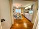 Traditional dining room with hardwood flooring, decor, and furniture in a cozy home at 313 Palo Verde Dr, Leesburg, FL 34748