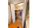 Organized walk-in closet with ample storage space for clothes and accessories at 313 Palo Verde Dr, Leesburg, FL 34748