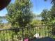 Balcony overlooking a scenic lake and lush greenery at 4318 Aqua Vista Dr # K, Orlando, FL 32839