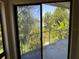 Balcony overlooking a scenic lake and lush greenery at 4318 Aqua Vista Dr # K, Orlando, FL 32839