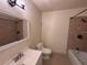 Tiled bathroom featuring a shower and a bathtub at 4318 Aqua Vista Dr # K, Orlando, FL 32839