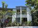 Attractive condo building surrounded by lush tropical landscaping, a serene and inviting complex at 4318 Aqua Vista Dr # K, Orlando, FL 32839
