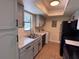 Efficient kitchen with black appliances and light-colored cabinetry, offering modern functionality at 4318 Aqua Vista Dr # K, Orlando, FL 32839