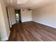 Spacious living room featuring stylish flooring, neutral walls, and ample space for furniture at 4318 Aqua Vista Dr # K, Orlando, FL 32839