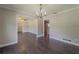 Elegant dining area featuring hardwood floors, chandelier lighting and neutral wall paint at 4514 Crichton Ln, Orlando, FL 32806
