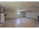 Spacious garage with ample storage space and an automatic garage door at 4514 Crichton Ln, Orlando, FL 32806