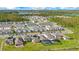 Expansive aerial showcases homes with screened-in pools in a thriving community at 6066 Arbor Watch Loop, Orlando, FL 32829