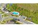 Community pool and playground nestled near a wooded area at 6066 Arbor Watch Loop, Orlando, FL 32829