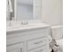 Clean bathroom with white cabinets, a modern sink, and a toilet at 6066 Arbor Watch Loop, Orlando, FL 32829