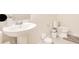 Minimal bathroom with white pedestal sink and low-flow toilet design at 6066 Arbor Watch Loop, Orlando, FL 32829