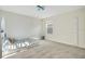 Bright bedroom with neutral carpet, play decor, and natural light at 6066 Arbor Watch Loop, Orlando, FL 32829