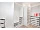 Spacious walk-in closet featuring built-in shelving and storage at 6066 Arbor Watch Loop, Orlando, FL 32829