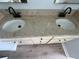 Bathroom vanity with double sinks and granite counters at 6608 Madeira Ave, Lakeland, FL 33811