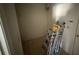 Storage closet offering potential for organization, with renovation ladder at 6608 Madeira Ave, Lakeland, FL 33811