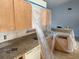 Renovated kitchen featuring sleek countertops, cabinets, and stainless steel sink at 6608 Madeira Ave, Lakeland, FL 33811