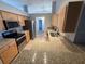 Open kitchen with stainless steel appliances and plenty of cabinet space at 6608 Madeira Ave, Lakeland, FL 33811
