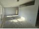 Spacious living room filled with natural light, offering a blank canvas for decor at 6608 Madeira Ave, Lakeland, FL 33811