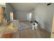 Spacious room with new paint and natural light from the sliding doors at 6608 Madeira Ave, Lakeland, FL 33811