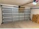 Spacious two-car garage with an automatic door and plenty of room for storage at 6616 Shepherd Oaks St, Lakeland, FL 33811