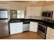 Well-equipped kitchen with stainless steel appliances and a window to backyard at 6616 Shepherd Oaks St, Lakeland, FL 33811