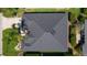 Aerial view of the home's roof, the yard and the mature landscaping at 7214 Se 171St Brookhaven Pl, The Villages, FL 32162