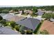 Aerial view of the house, showing the roof and surrounding neighborhood at 7214 Se 171St Brookhaven Pl, The Villages, FL 32162